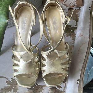 Golden metallic stiletto heels in good previously loved condition